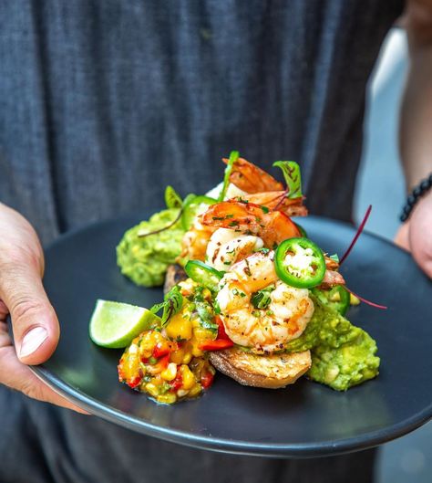 Indigo Double Bay on Instagram: “Indigo classic // King Prawn Bruschetta 🦐 Served with mango & corn salsa, jalapeño, lime & guacamole 👌🏻🌶” King Prawn Starter, Prawns Cocktail, Prawn Bruschetta, Mango Corn Salsa, Seafood Starter, Prawn Starters, Plated Meals, Avocado Dressing Recipe, Delicious Vegetarian Dinner