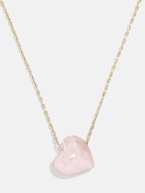 Opt for a little self love in your stack when you choose the Juno Necklace. This piece features a dainty gold chain complete with a heart-shaped rose quartz pendant. Rose quartz represents and helps manifest self love, compassion, and romance, so this piece is sure to add good vibes to your necklace collection. Heart Rose Quartz, Gold Birthstone Necklace, Semi Precious Necklace, Gold Medallion Necklace, Bauble Bar, Stone Roses, Ups Shipping, Custom Initial Necklace, 18k Gold Necklace