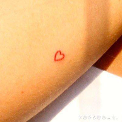 Pin for Later: Get a Close-Up of Kylie Jenner's Rumored New Tattoo Little Red Heart Tattoo, Kylie Jenner's Tattoos, Red Heart Tattoo, Red Heart Tattoos, Small Heart Tattoos, Bow Tattoo, Red Ink Tattoos, Jewelry Tattoo, Hip Tattoo