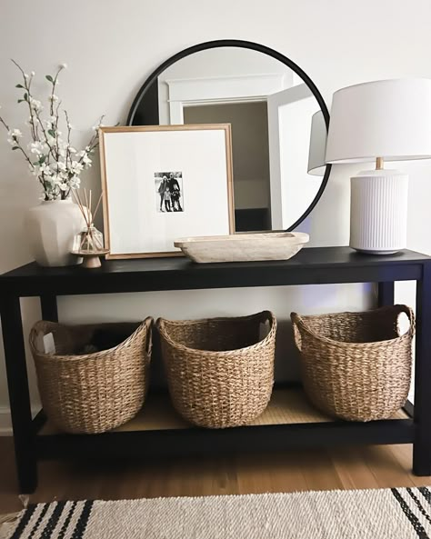 Mantle Decor Organic Modern, Natural Decor With Black Accents, Black Entryway Table Decor With Mirror, Black White And Wicker Living Room, Decorating Small Tables Ideas, Black And Tan Entryway, Black And Cream Entryway, Black And Cream Home Decor, Fish Bowl Decor Ideas