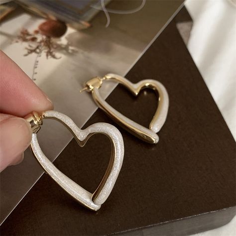 Classification 
						 Hoop Earrings 
					 
 
						 Design 
						 Enamel 
					 
 
						 Gender 
						 Women's 
					 
 
						 Material 
						 Copper 
					 
 
						 Occasion 
						 Holiday 
					 
 
						 Pattern 
						 Heart Shape 
					 
 
						 Quantity 
						 1 Pair 
					 
 
						 Style 
						 Sweet 
					 
 
						 Weight 
						 7g Hoop Earrings Design, Dating Gifts, Heart Hoop Earrings, Hollow Heart, Earrings Design, Enameled Copper, Holiday Patterns, Sweet Heart, Vintage Elegant