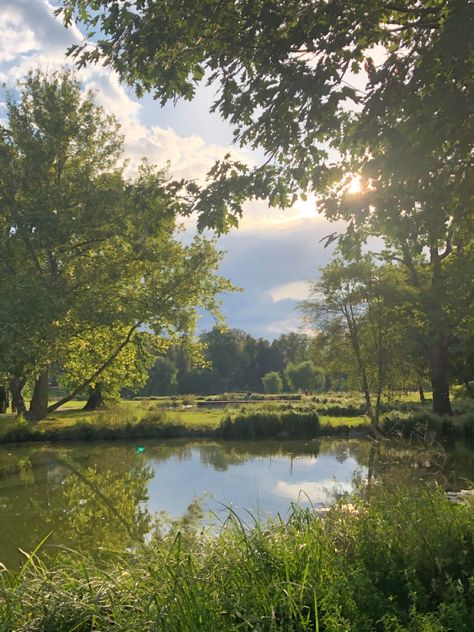 Lake Surrounded By Trees, Spring Lake Aesthetic, Green Pastures Still Waters, River Landscape Painting, Green Sunset Aesthetic, Green Lake Aesthetic, Green Park Aesthetic, Aesthetic Park Pictures, Grassland Aesthetic