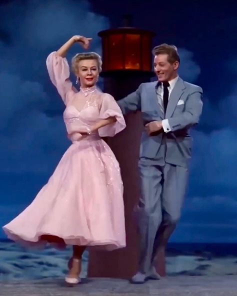 Omeleto Drama on Instagram: “@ag.tsai: I'd like to live in this world. White Christmas. 1954. Fun fact: Vera-Ellen and Danny Kaye are wearing pink and gray because it…” White Christmas Movie Costumes, Vera Ellen White Christmas Pink Dress, Vera Ellen White Christmas, White Christmas Film, Vera Ellen Dancing, White Christmas 1954, Danny Kaye, Vera Ellen, Ellen Show