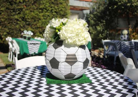 GOAL! Greyson's Soccer Birthday | CatchMyParty.com Soccer Paper Lantern Centerpieces, Simple Soccer Party Decorations, Soccer Theme Party For Adults, Soccer Banquet Ideas Table Decorations, Soccer Lantern Centerpiece, Fifa Soccer Party Ideas, Soccer Birthday Centerpieces, Soccer Party Centerpiece Ideas, Soccer Party Table Decor