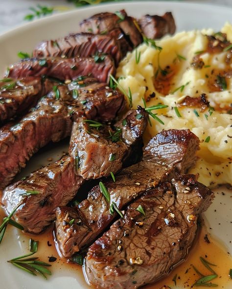 GARLIC BUTTER STEAK BITES AND MASH 🥩🧈 Ingredients: 1 lb sirloin steak, cut into bite-sized pieces Salt and pepper, to taste 2 tbsp olive oil 4 tbsp unsalted butter 4 cloves garlic, minced 1 tbsp fresh parsley, chopped Mashed Potatoes: 4 large potatoes, peeled and cubed 1/2 cup milk 4 tbsp unsalted butter Salt and pepper, to taste Directions: Step 1: Prepare the Mashed Potatoes Place the cubed potatoes in a large pot and cover with water. Add a pinch of salt and br... Steak With Mashed Potatoes, Food Aversion, Steak Sirloin, Stadium Food, Steak And Mashed Potatoes, Garlic Butter Steak Bites, Brooklyn Food, Butter Steak Bites, Steak And Potatoes