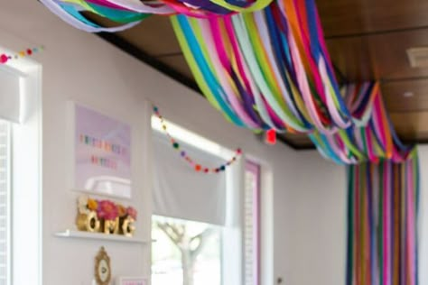 Hanging Crepe Paper Streamers, Rainbow Streamers Ceiling, How To Twirl Streamers, Streamer Decorating Ideas, Decorating With Paper Streamers, Rainbow Streamers Decorations, Birthday Decor With Streamers, Crepe Paper Wall Backdrop, Paper Crepe Decoration