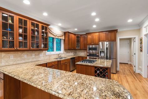 How to Style Brown Granite Countertops: Ideas and Inspo Pics How To Style Brown Granite Countertops, Cream Kitchen Cabinets With Brown Granite, Color Cabinets With Brown Granite, Black Cabinets With Brown Granite, Tan And Black Granite Countertops, Light Brown Granite Countertops, Backsplash With Tan Granite, Backsplash For Brown Granite Countertops, Outdated Granite Countertops