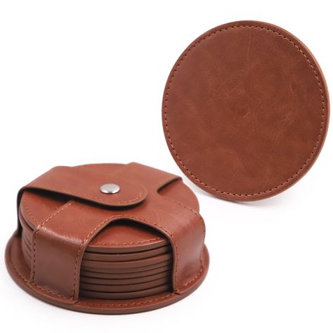 TOSSOW Coasters for Drinks, PU Leather Coaster 8 Pcs with Holder, Durable and Non-Slip Coaster for Protection Tabletop, Wooden Table, Desk, Bar, Coasters Fit All Cups (Brown) PU Leather Design: Our round coasters are made of PU leather material, leather surface is smooth but not slip and slide on surfaces. Both sides leather and sewn with threads stitches run through and looks really classy and elegant.PU leather it's a faux leather, is a poly synthetic split leather. Round Coaster Size: Coaster diameter: 3.58 inch(9.1 cm), Coaster thickness: 0.12inch(0.3 cm). Package include 8 PCS with PU leather holder, they come in a holder so they don't get misplaced. Large enough to hold most of the cups and glasses, perfect coasters for both hot and cold beverages. Easy to Clean: They easy to clean, Leather Kitchen Accessories, Scrap Leather Projects, Desk Bar, Leather Coaster, Black Coasters, Leather Kitchen, Diy Leather Projects, Leather Scrap, Laser Projects