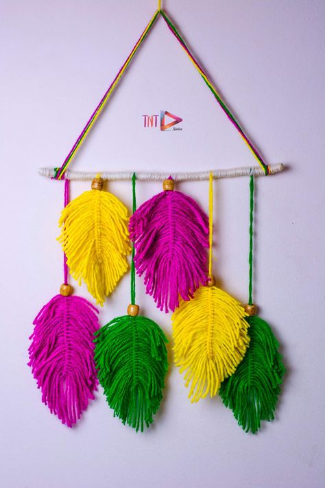 DIY Wool leaves wall hanging | Macrame Feathers | Macrame leaves Boho Wall Decor Wool Feathers Diy, Wool Wall Hanging Diy, Yarn Feathers, Macrame Leaves, Unique Easter Eggs, Wool Wall Hanging, Macrame Feathers, Feather Diy, Feather Wall Hanging