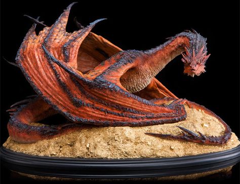 You can't call yourself a Hobbit fan unless you have the mother of all statues in your collection. That would be this The Hobbit: The Desolation of Smaug - Smaug the Terrible Statue.  It is a lLimited edition of only 2,000 pieces and measures 11 3/4-inches tall including the base. This st Smaug Dragon, Hobbit Desolation Of Smaug, The Desolation Of Smaug, Desolation Of Smaug, Weta Workshop, Bilbo Baggins, Gra O Tron, Gandalf, Fantasy Dragon