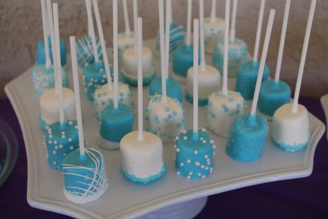 Frozen Theme Marshmallow pops Frozen Marshmallow Pops, Winter Wonderland Food Table, Christmas Covered Strawberries, Frozen Pretzels, Fairytale Baby Shower, Wonderland Sweet 16, Frozen Birthday Party Decorations, Pastry Ideas, Graduation Party Foods