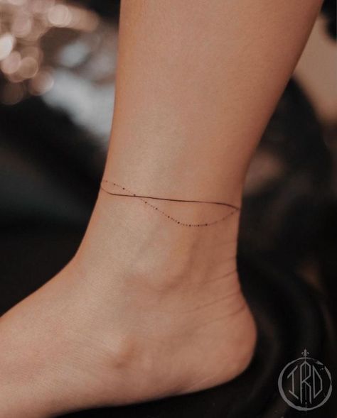 Simple Body Tattoos For Women, Tattoos Ankle Bracelet, Minimalist Bracelet Tattoo, Anklet Tattoos For Women Simple, Line Tattoo Ankle, Anklet Tattoos Wrap Around, Ankle Chain Tattoo, Wrap Around Ankle Tattoo, Ankle Tattoos For Women Wrap Around