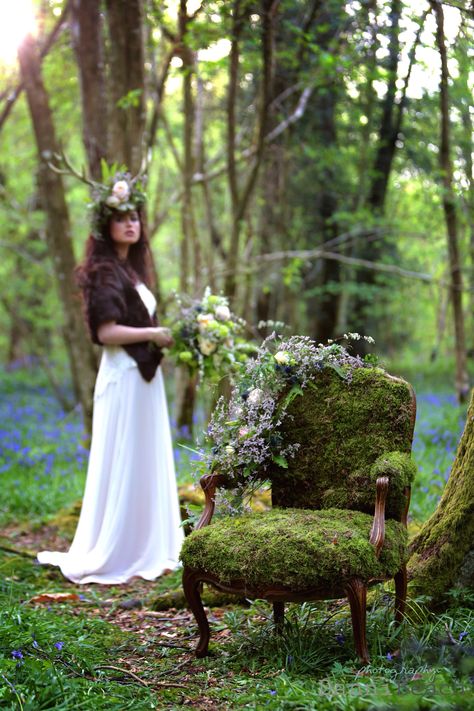 Styled Photoshoot set in a enchanting Sussex bluebell wood using a custom made antler bridal headpiece and a moss covered chair. The final images are strong and magical giving an almost fairytale feel. CREDITS Danni Beach Photography Flowerbug Designs,  & Mathilda Rose Bridal Boutique  #antler #bride #floralcrown #inspiration #woodland #bluebells #sussex #rustic #lace #johannahehir #blush #ivory #mosschair #fairytale #magical #romantic #stag #bouquet #wedding #bridal #styledshoot Enchanted Forest Headpiece, Moss Covered Chair, Chair With Flowers Photoshoot, Bluebell Photoshoot, Wood Photoshoot, Moss Chair, Woods Photoshoot, Fairy Shoot, Forest Enchanted