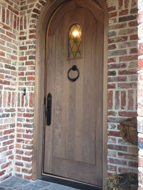 Walnut door installed and ready to be stained ... Arches In Homes Interiors, Arches In Homes, Mix Of Modern And Antique, Brick Door, Stained Front Door, Arched Front Door, Farm Villa, Antique French Doors, Chicago Brick