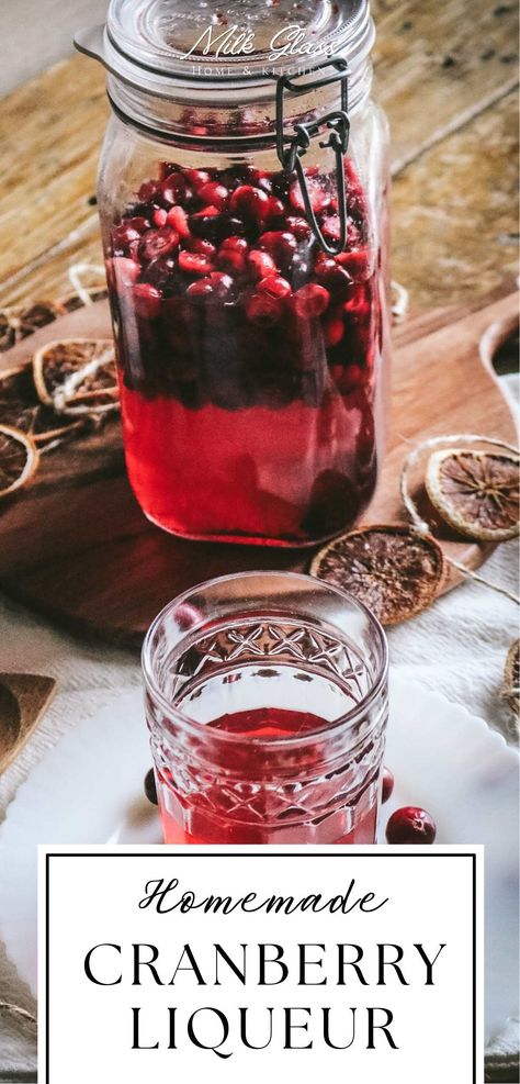 Ruby red and full of fresh cranberry flavor, this homemade cranberry liqueur is an easy way to put some fresh cranberries to good use. Just combine everything together, let it hang out for a few weeks, then strain and serve. Makes a great holiday gift, too! Cranberry Liqueur Homemade, Cranberry Moonshine Recipes, Home Made Liquor Recipes, Cranberry Liquor Recipe, Boozy Cranberries, Cranberry Cordial Recipe, Canning Cranberry Sauce, Infused Spirits, Homemade Liqueur