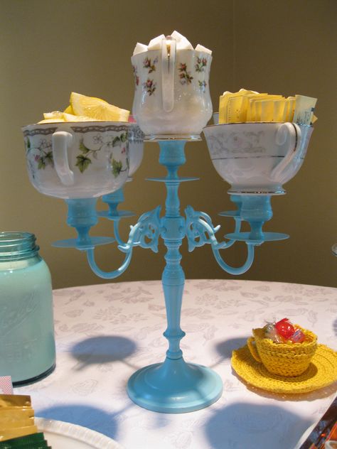 Teacup Candleabra! Found candleabra at tag sale, spray painted aqua; found teacups at thrift stores and used epoxy to attach to each candle holder. Fill with sugar cubes, sweetener packets & honey! Tea Cup Repurpose, Tea Cup Chandelier, Cup And Saucer Crafts, Teapot Crafts, Diy Tea Party, Porcelain Candle, Teacup Crafts, Alice In Wonderland Tea Party, Redo Furniture