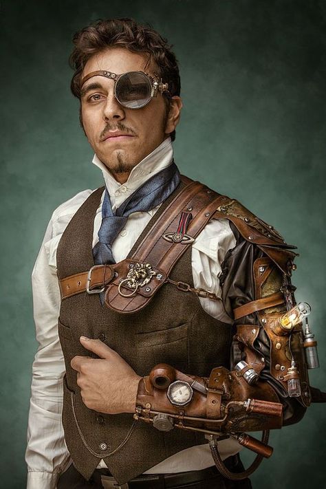 Monocled Steampunk Man - Large glass monocle, high collared shirt, tie, waistcoat (vest), pocket watch, trousers, steam-powered bracer/mechanical arm. Men's Steampunk fashion inspiration! - For costume tutorials, clothing guide, fashion inspiration photo gallery, calendar of Steampunk events, & more, visit SteampunkFashionGuide.com Steampunk Male, Steampunk Mode, Moda Steampunk, Steampunk Man, Steampunk Gadgets, Steampunk Men, Mode Steampunk, Steampunk Tendencies, Steampunk Couture