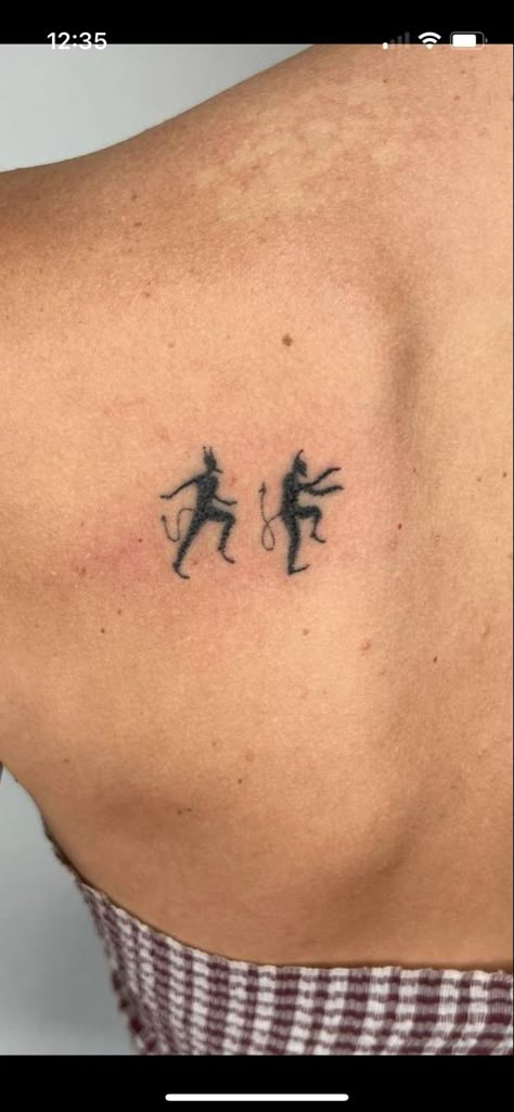 Tiny Demon Tattoo, Devils Advocate Tattoo, Shared Tattoos Matching Tat, Meaningful Matching Tattoos Friends, Angel Devil Shoulder Tattoo, Tiny Clown Tattoo, Dancing Devil Tattoo, Simple Demon Tattoo, Cool Small Tattoos For Men Unique