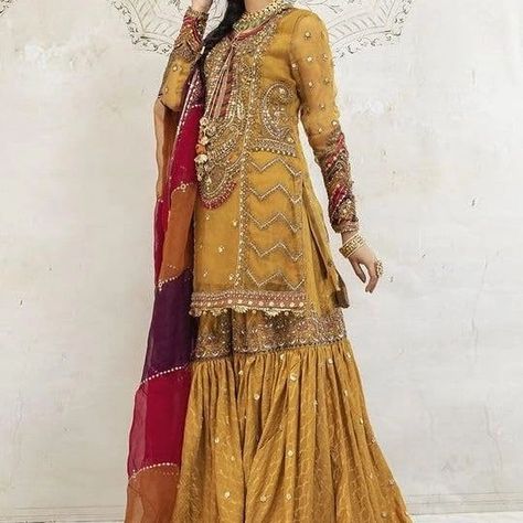 Pakistani dresses for women wedding bridal Indian salwar kameez custom stitch mehndi yellow maxi Pishwas sharara #https://amzn.to/3QlayK8 Traditional Gharara, Maria B Bridal, Bridal Gharara, Pakistani Mehndi Dress, Pakistani Bridal Dress, Mehndi Dress, Yellow Traditional, Color Dresses, Beautiful Pakistani Dresses