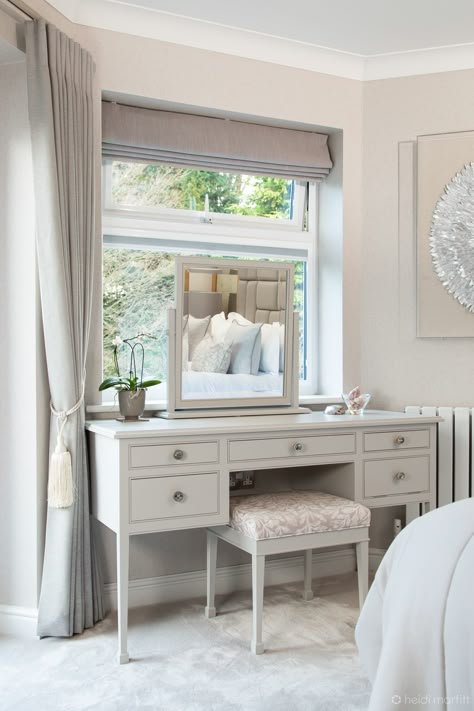 This recent bedroom project features our dressing table with matching mirror and stool. The tapered legs and spade feet give this a beautiful, elegant look. One of the drawers has sockets fitted so you can keep hair styling appliances out of sight with no messy cables in view. The furniture is finished in Purbeck Stone from @farrowball with mother of pearl handles from @chloealberry. This can be a fitted or freestanding piece, perfect for your bedroom.⁠ ⁠ #bedroom #furniture #dressingtable Upholstered Dressing Table Stool, Country Dressing Table, Dressing Table In Window, Dressing Table Window, Dressing Table In Bay Window, Dressing Table In Front Of Window, Dressing Table Under Window, Vanity Ideas Bedroom Aesthetic, Window Dressing Table