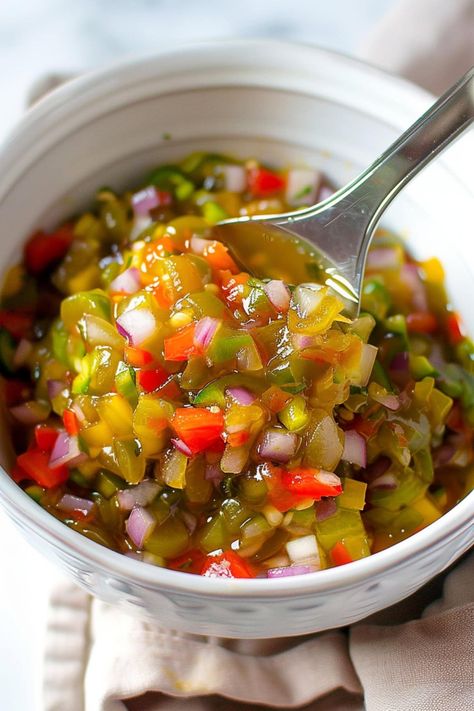 This pepperoncini relish is so easy to make at home! The spicy mixture is the perfect topping for meats, sandwiches, hot dogs, and more! Recipes With Peppercinis, Fresh Pepperoncini Recipes, Italian Hot Peppers In Oil Recipes, Pepperoncini Relish, Hot Dog Relish Recipe, Hot Dog Relish, Homemade Hot Dogs, Gourmet Hot Dogs, Hot Dog Toppings