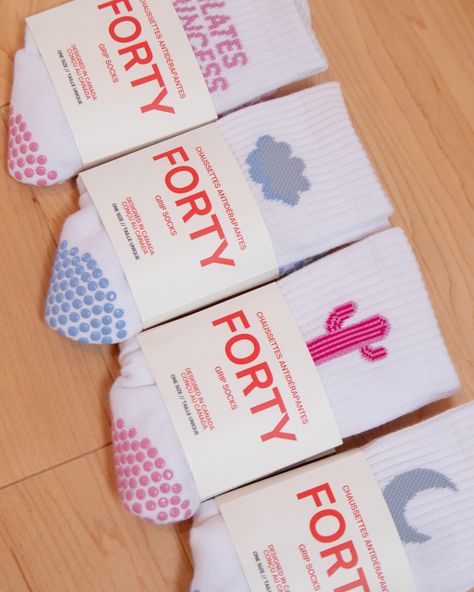 New styles coming later this week, grab these pinks and blues while you still can ☁️🩰 📸 @annagraacee #fortygripsocks #fortymeansstrong #gripsocks #barresocks #pilatessocks #lagreesocks Sock Branding, Pilates Socks, Socks Packaging, Packaging Design, Packaging, Socks, Product Launch, Branding, Pink