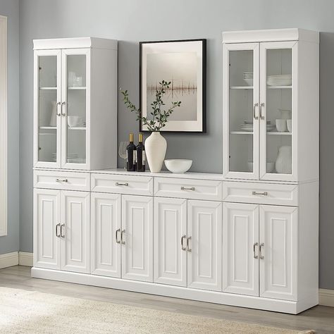 Functional and beautiful cabinet set. All cabinets have double doors, magnetic closures, and concealed hinges. Use as a pantry or incorporate into your TV room as a modified built in entertainment center.