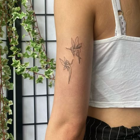 Cute Tattoos Back Of Arm, Tattoo Ideas For Girls Arm, Cute Tattoo Sleeve Ideas, Single Line Fairy Tattoo, Fairy Tattoo On Arm, Cute Linework Tattoo, Tattoos On The Back Of The Arm, Two Fairies Tattoo, Fairy Tattoo Arm