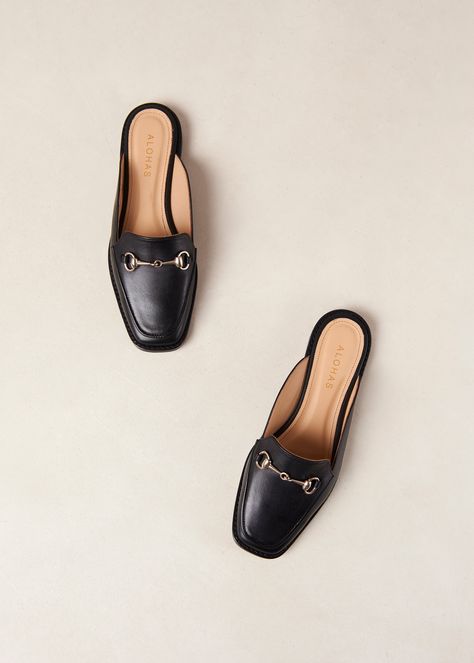 Black leather loafer mules With a pair of Kais mules in your closet, nailing the smart-casual dress code is no longer tricky terrain. Topped with snaffle-trim hardware, they have enclosed uppers made in black leather and no back - it’s like a slipper, but for the great outdoors. Loafer Mules Outfit, Mules Outfit, Smart Casual Dress Code, Brown Jumpsuits, Smart Casual Dress, Black Leather Mules, Sustainable Leather, Black Leather Loafers, Black Loafers