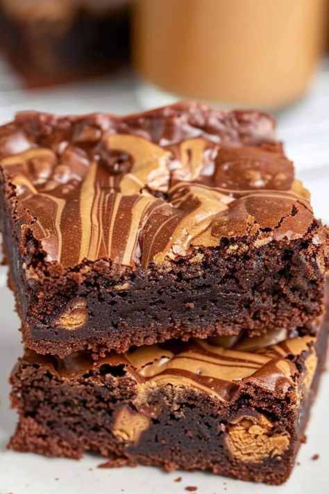 Rich and dreamy peanut butter brownies - need I say more? They're impossibly indulgent and deliciously luxurious. One bite will satisfy all your cravings. Boxed Brownies With Peanut Butter, Best Peanut Butter Brownies, Peanut Butter Brownies Recipe Homemade, Chocolate Peanut Butter Brownies Easy, Chocolate And Peanut Butter Brownies, Healthy Peanut Butter Brownies, Brownie Recipes Peanut Butter, Peanut Butter Brownie Bars, Peanut Butter Swirl Brownies Box Recipes