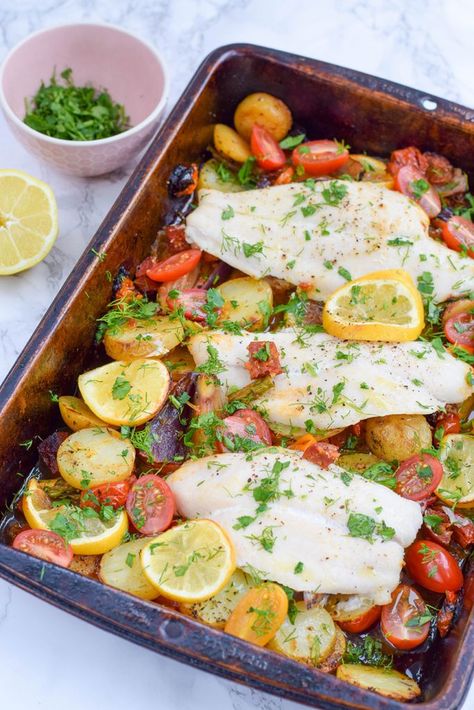 An effortless rainbow vegetable and fish tray bake made with simple ingredients that makes the perfect mid-week family meal. Fish Tray Bake, Sea Bass Fillet Recipes, Tray Bake Recipes, Tray Bake, The Best Game, Keto Cooking, Baked Fish, Sea Bass, Family Meal