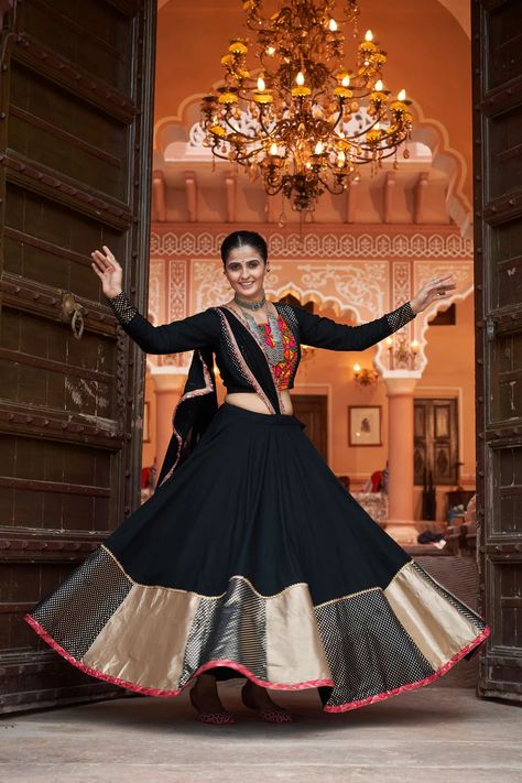 This festive season, redefine sophistication with our exclusive Black Navaratri Collection. Featuring exquisite designs that blend traditional charm with modern elegance, each piece is crafted to make you stand out and celebrate in style. . . . Shop Now: www.mohifashion.com . . . . #lehenga #lehengacholi #designerlehenga #weddinglehenga #lehengas #lehengainspiration #lehengagoals #lehengasmumbai #lehengabanglore #lehengasaree #lehengalove #LehengaLookBook #lehengasalwarsuit #lehengashot Chania Choli, Navratri Lehenga, Chaniya Choli Designs, Garba Dress, Ghaghra Choli, Mirror Work Blouse, Black Lehenga, Navratri Festival, Georgette Lehenga