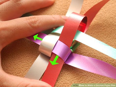 4 Ways to Make a German Paper Star - wikiHow Aesthetic Origami, Origami Christmas Star, Diy Thanksgiving Cards, Folded Paper Stars, Paper Ornaments Diy, Craft Ideas For Beginners, German Star, Paper Folding Crafts, Christmas Tree Star Topper