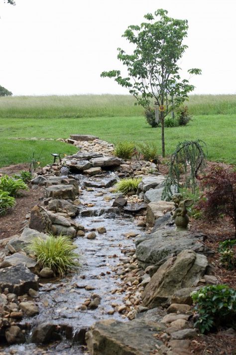 Perfect for water drainage after a storm, would look lovely as a dry creek bed too. Backyard Stream, Kolam Koi, Taman Air, Dry Creek Bed, Dry River, Creek Bed, Dry Creek, Water Features In The Garden, Rain Garden