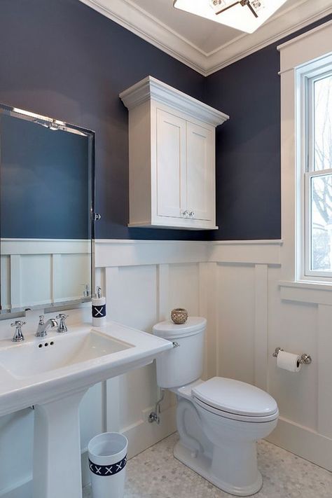 Board and Batten Bathroom. What a great bathroom design! I love the combination of board and batten wainscoting with navy walls painted in Newburyport Blue by Benjamin Moore. The board and batten wainscoting was enameled in BM White Dove. The wainscoting was installed using multiple trim boards at approximately 54" height. The floor tile is a marble hexagon.: Bathroom Wainscotting, Newburyport Blue, Board And Batten Wainscoting, Bathroom Wainscoting, Wainscoting Height, Makeover Kamar Mandi, Beadboard Bathroom, Standard Bathroom, Wainscoting Bathroom