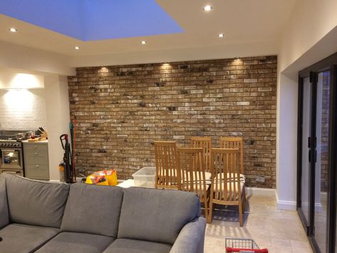 Brick slip internal wall Exposed Brick Wall Fireplace, Brick Slip Feature Wall, Brick Slips Living Rooms, Brick Slip Media Wall, Internal Brick Wall Ideas, Internal Brick Wall, Brick Wall Dining Room Ideas, Brick Slip Wall, Brick Wall In Living Room