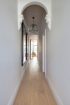 Gallery of St Kilda Cottage House / Jost Architects - 28 White Foyer, Victorian Hallway, Entrance Way, Hallway Designs, Entry Hallway, St Kilda, Cottage House, Wood Doors Interior, Interior Barn Doors