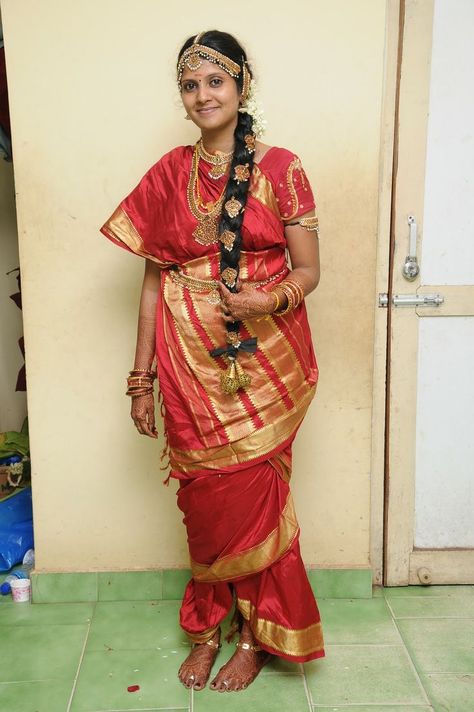 Tamil Brahmin Bride in Traditional Nine Yard Madisar Saree Tamil Brahmin Bride, Madisar Saree, India Wedding Dress, Yoga For Pregnant Women, Tamil Bride, Temple Jewelery, Draping Ideas, Kashta Saree, Saree Drape