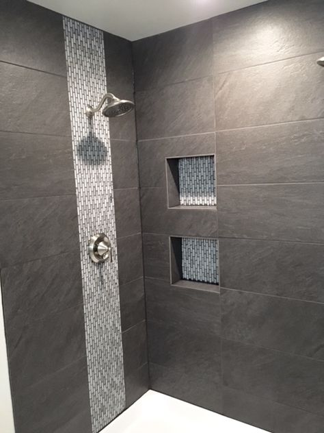 Shower Tile Waterfall Design, Washrooms Tiles Ideas, Tile Mix And Match, Bathroom Shower Waterfall, Walk In Shower Designs Tile Modern, Waterfall In Shower Tile, Bathroom Waterfall Tile Design, Showers With Pebble Floors River Rocks, Shower Accent Tiles