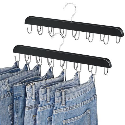 PRICES MAY VARY. 👖【Integrated Jeans Hanger】Made of high-grade wood and stainless steel, without any assembly, jean hangers can directly hang, no need to fold, no need to clip, making the wardrobe look cleaner and more orderly. 👖【14 Pcs Large Capacity】A strong Jeans hangers has 14 Hooks, which can hang 7 pieces of jeans on each side, and the 180°rotating hooks can rotate the jeans to a direction similar to the hanger, saving more space in the closet . 👖【Deep " U " Hooks Design】The hooks embedd Hanging Jeans On Hooks, Jean Storage, Jean Hangers, Jeans Hanger, Jeans Storage Ideas, Hanging Jeans, Jean Organization, Clip Hanger, Hanging Closet Organizer