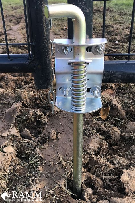 Installing a gate anchor is like having an extra pair of hands when you need them most. This gate anchor keeps gates in place while you move horses, cattle, or equipment through the gate opening, all while preventing the gate from sagging! Simple to use; this anchor only requires you to apply pressure to the pressure plate for it to move up and down smoothly. It's by far the most useful tool in the gate latch family. #gateanchor #rammfence #equestrian #flexfence #horses #horsefence #fencegate Cattle Gate, Fences Alternative, Yard Privacy, Horse Fencing, Gate Locks, Farm Gate, Gate Latch, Metal Barn, Fence Gate