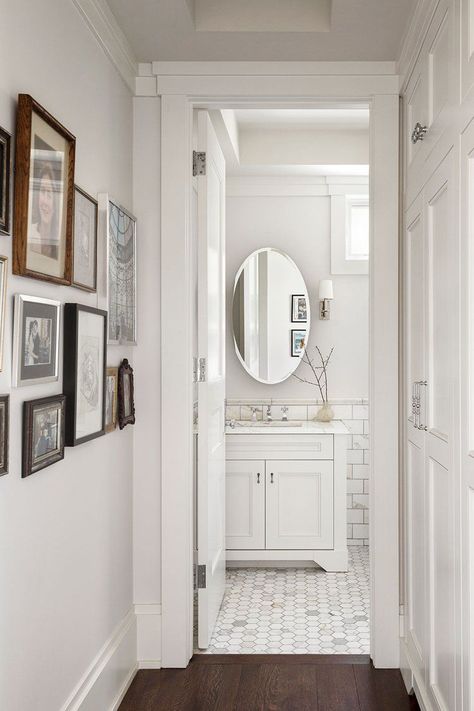 32 Half Bathroom Ideas That Prove It's the Perfect Place to Experiment With Design Neutral Bathroom Paint, Neutral Bathroom Paint Colors, Timeless Bathrooms, Bathroom Wainscoting Ideas, Hexagon Tile Bathroom, Bathroom Wainscoting, White Hexagon Tiles, Hexagon Tile Floor, Gray And White Bathroom