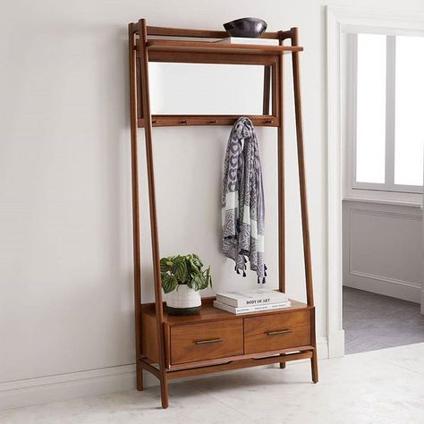 Crafted from FSC®-certified wood, our 'Mid-Century Hall Stand' combines modern-day sustainability & timeless style 😎 #organised #tidy… Mid Century Clothes Rack, Entryway Furniture Ideas, Coat Stand Hallway, Hallway Stand, Shelving Cabinet, Mudroom Benches, Mid Century Storage, Indoor Benches, Modern Hall