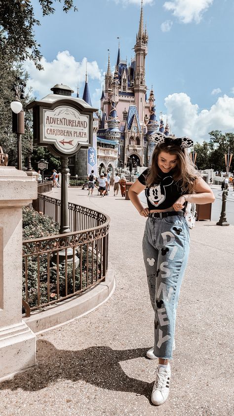 Tall girl standing in front of disney castle wearing mickey ears, a mickey shirt, and disney jeans. Disneyland Fits, Disney Jeans, Disney Fits, Disneyland Outfits, Diy Disney, Disney Diy, Disney Outfits, Disney World, Disneyland