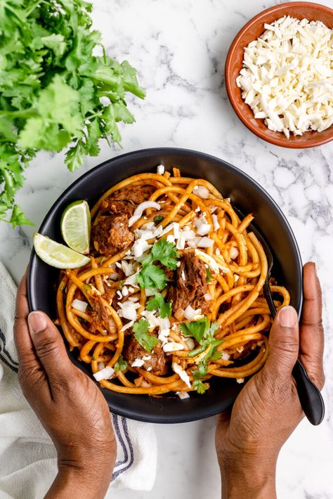 This birria pasta recipe takes the rich, bold flavors of birria and combines them with the comforting texture of pasta. While most birria recipes on social media are for birria tacos or birria ramen, this dish takes hearty and satisfying bucatini pasta and slathers it in savory Mexican birria.  This mouthwatering meal takes leftover birria... Read More The post How to Make Birria Pasta- NOT Ramen appeared first on Simplified Chef. Beef Birria Pasta, Birria Ramen Noodles, Birra Ramen Noodle Recipes, Birria Ramen Crockpot, Birria Ramen Trader Joes, Leftover Birria, Birria Recipes, Birria Ramen, Mexican Birria