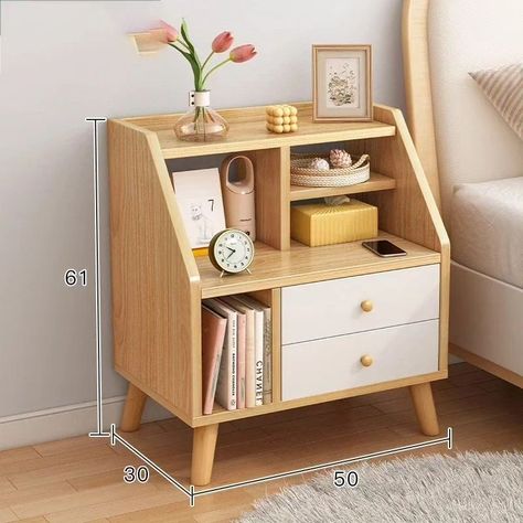 Bedside table with compartments and two drawers Ksh 6,000 ▫️Storage Compartments: For decorative items,small plant, lamp, alarm clock, and other bedside essentials. ▫️Sections for organizing books or small gadgets. ▫️A shelf beneath the partitioned storage for easy access to frequently used items like a tablet or magazines. ▫️Two spacious drawers at the bottom, offering concealed storage for personal items and ensuring a clutter-free appearance. ☎️0719229187 📌Location:Superior Arcade along Ac... Corner Shelves Design, Shelves Design Ideas, Organizing Books, Plant Lamp, Light Colored Furniture, Shelves Design, Kb Homes, Cute Furniture, White Bedside Table