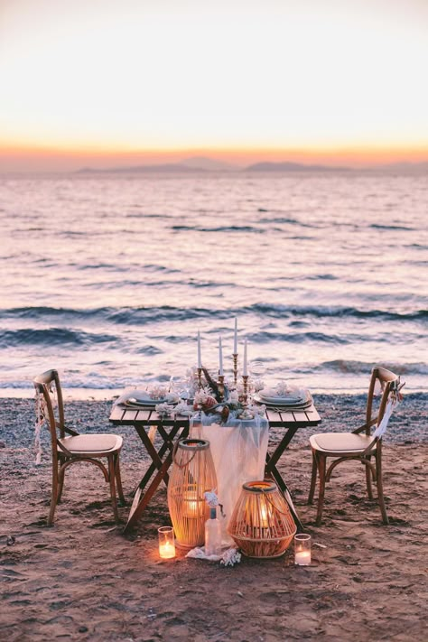 This sunset wedding dinner set at a private beach of the Athenian Riviera is an ode to the laid back luxury and summer vibes | Athens Wedding Planner & Designer: @mitheoevents Photo: @pahountisg Venue: Kavouri private beach | #mitheoevents #weddingplannergreece #destinationweddingplanner #athenswedding #elopement #beachwedding #intimatewedding #seathemewedding #weddingdinner #weddingstyling #weddingdecor #romanticdinner #beachdinner #tablesetting #beachdecor #sunsetdinner #tablescape Romantic Dinner At Beach, Private Beach Dinner, Private Wedding Dinner For Two, Beach Dinner Ideas Romantic, Romantic Beach Picnic Couple, Private Dinner For Two Romantic, Beach Romantic Dinner, Beach Set Up, Table For Two Romantic