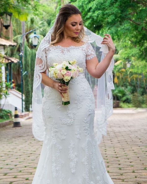 This slightly off the shoulder plus size wedding dress hass short cap sleeves.  Fuller figured brides searching for custom #plussizeweddingdresses will like this beaded lace option a lot.  Custom designs and #replicas of couture #dresses for way less than the original are all options with our US dress design firm.  Pricing and more detaisl on our process can be obtained when you email us from our official website at DariusCordell.com Wedding Dresses Size 16 Curvy Bride, Wedding Dress For Plus Size, Off The Shoulder Plus Size, Plus Wedding Dresses, Plus Size Wedding Dress, Custom Wedding Gown, Plus Size Brides, Wedding Gown Styles, Plus Size Wedding Gowns