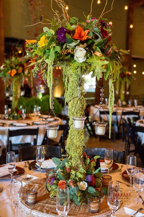 Rustic moss covered candelabra centerpiece....not crazy about the top, but love the idea of the base. Dramatic Table Centerpieces, Moss Wedding Centerpiece, Moss Centerpiece Wedding, Enchanted Forest Theme Party, Moss Centerpiece, Enchanted Forest Wedding Theme, Hanging Wreaths, Forest Theme Party, Topiary Centerpieces