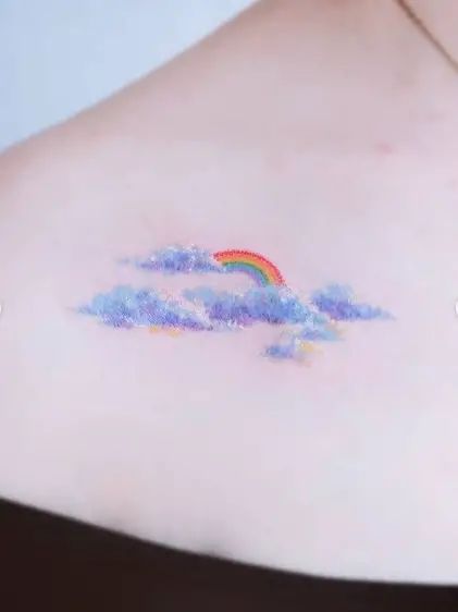 Rainbow Letters Tattoo, Realistic Rainbow Tattoo, Butterfly Rainbow Tattoo, Rainbow Clouds Tattoo, Pastel Rainbow Tattoo, Cloud Rainbow Tattoo, Heart Bubble Tattoo, Rainbow And Cloud Tattoo, Rainbow Wrist Tattoo